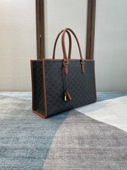 CELINE 25S HORIZONTAL CABAS 43MM IN BLACK TRIOMPHE CANVAS AND TAN BROWN CALFSKIN