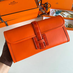 JIGE ELAN 29 CLUTCH IN BRIGHT ORANGE CALFSKIN WITH LIZARD SKIN