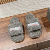 FURRY SLIDES IN GRAY CURLY SHEARLING
