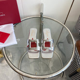 VIV' BY THE SEA LOVE METAL MULES IN SILVER PATENT CALFSKIN