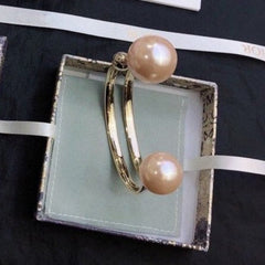 DIO TRIBALES BANGLE GOLD AND PEARL PINK BRACELET