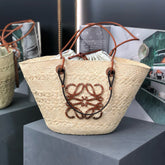 MEDIUM ANAGRAM BASKET BAG 46 IN BEIGE IRACA PALM AND TAN CALFSKIN