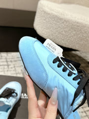 PRADA 25S DEXUN MULE IN LIGHT BLUE SUEDE LEATHER