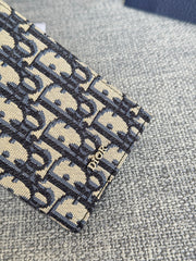 VERTICAL LONG WALLET 19 IN BLUE MONOGRAM OBLIQUE JACQUARD