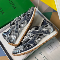 BOTTEGA VENETA 26S SNEAKERS IN DARK BLUE GREY AND SILVER TPU MATERIAL