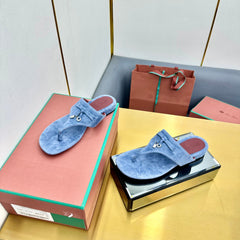 FLIP FLOPS IN BLUE SUEDE AND HARDWARE SILVER