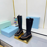 PRADA 25S TALL CHELSEA BOOTS 50MM IN BLACK CALFSKIN