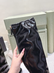 CHANEL 25S KNEE-HIGH BOOTS 60MM IN BLACK PATENT CALFSKIN WEDGE HEELS