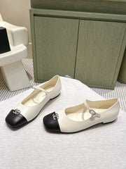 CHANEL 25S MARY JANE FLATS IN IVORY LAMBSKIN WITH BLACK CAP TOE SILVER HARDWARE