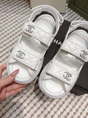 CHANEL 25S SANDALS IN WHITE PATENT CALFSKIN SILVER HARDWARE