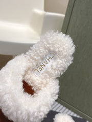 CHANEL 25S INDOOR SLIPPERS IN CARAMEL AND BLACK SUEDE FUR-LINED