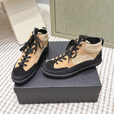 CHANEL 25S HIGH-TOP SNEAKERS IN BLACK AND BROWN CALFSKIN AND SUEDE