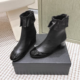 CHANEL 25S ANKLE BOOTS IN BLACK CALFSKIN GLOSSY TOE RUCHED