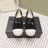 CHANEL 25S MOCCASINS IN BLACK AND LIGHT GREY SUEDE