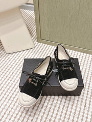 CHANEL 25S MOCCASINS IN BLACK AND LIGHT GREY SUEDE