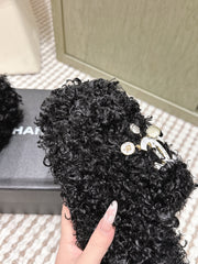 CHANEL 25S CLASSIC FURRY SLIDES IN BLACK WITH DOUBLE C LOGO