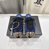 PRADA 25S MULES IN DARK BLUE WITH METAL TOECAP