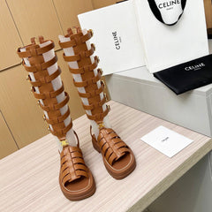 Triomphe high boots leather buckles Ginggerbread Brown