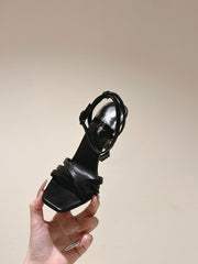 YSL 25S HIGH-HEEL SANDALS 100 MM IN BLACK LAMBSKIN WITH YSL LOGO HEEL DESIGN