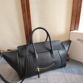 CELINE 25S MEDIUM SMILING NEW LUGGAGE 36MM IN BLACK SUPPLE SHINY LAMBSKIN