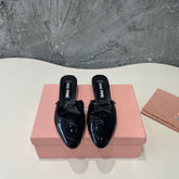 CAP TOE MULES BLACK SHEEPSKIN
