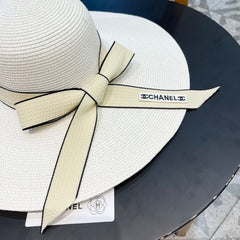 WIDE BRIM STRAW HAT WITH BOW WHITE 672704