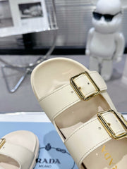 PRADA 25S STRAP SLIDES 30MM IN CREAM CALFSKIN GOLD HARDWARE