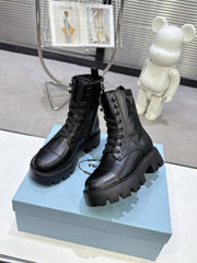 PRADA 25S WARRIOR BOOTS IN BLACK CALFSKIN