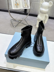 PRADA 25S ZIP-UP ANKLE BOOTS IN BLACK CALFSKIN
