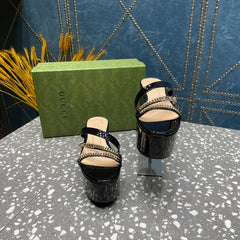 HIGH WEDGE PLATFORM IN BLACK CALFSKIN WITH GOLD HARDWARE