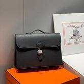 SAC A DEPECHES LIGHT 38 IN BLACK TOGO CALFSKIN