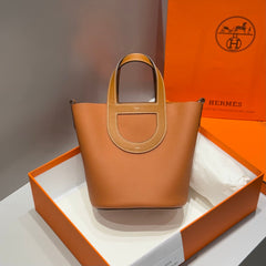 IN THE LOOP 18 IN FAUVE TOGO CALFSKIN SILVER HARDWARE