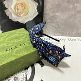 HAIRBAND IN NAVY BLUE FLORAL FABRIC 385854