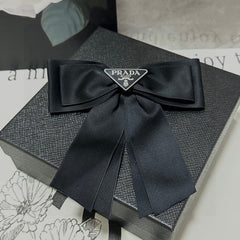 BOW HAIR CLIP IN BLACK RE-NYLON 423593