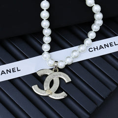 25P PEARL NECKLACE IN LIGHT GOLD STAR & HEART DOUBLE C PENDANT