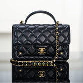 CHANEL 25S TOP HANDLE FLAP 19 CM IN BLACK LAMBSKIN WITH GOLD HARDWARE