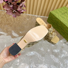 HORSEBIT SLIDE SANDAL IN ECRU BEIGE MONOGRAM CANVAS AND SHEEPSKIN LINING