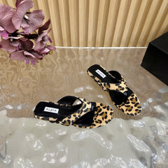ALAIA PLATFORM THONG SANDALS 25S IN LEOPARD PONY HAIR LEATHER