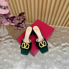 VALENTINO 25S HIGH-HEEL MULES 60 MM IN DARK GREEN VELVET AND CALFSKIN WITH GOLD HARDWARE