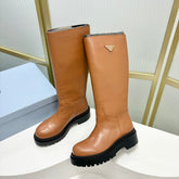 KNEE BOOTS WITH TRIANGLE LOGO IN CAMEL CALFSKIN