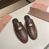 MULES SLIPPERS CHOCOLATE COLOR COWHIDE WITH GOLD COIN