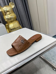 GG CASUAL SLIPPERS IN BROWN CALFSKIN LOGO EMBOSSING