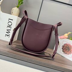 HAMMOCK SLICE 25 BAG IN PLUM PURPLE SHINY CALFSKIN