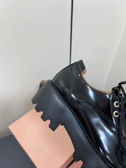 LACE-UP LOAFERS WITH THICK SOLE IN BLACK SHINY SHEEPSKIN