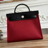 ZIP CABINE 31 BAG IN RUBY RED CANVAS AND BLACK CALFSKIN