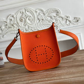 MINI NEO 17 EVELYNE BAG IN FIRE ORANGE CANVAS AND CALFSKIN