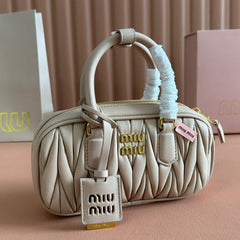 ARCADIE MATELASSÉ BAG 19 IN NUDE CALFSKIN GOLD HARDWARE