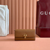 SOFTBIT CONTINENTAL WALLET 19 IN BROWN GRAINY CALFSKIN GOLD HARDWARE