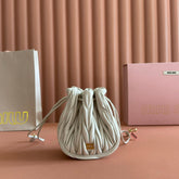MIUMIU 26S MATELASSE POUCH BAG 16 IN WHITE CALFSKIN GOLD HARDWARE