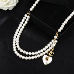 CHANEL 25S CHAIN BELT IN WHITE PEARL 614404